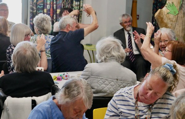 Assistant Provincial Grand Master David Barr (seated right) enjoying chair disco with centre members. Assistant Provincial Grand Master David Barr (seated right) enjoying chair disco with centre members.