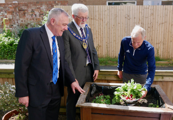 Pictured from left to right, are: Stephen Jelly, David Barr, with centre gardener Graham, discussing the benefits of radishes. Pictured from left to right, are: Stephen Jelly, David Barr, with centre gardener Graham, discussing the benefits of radishes.