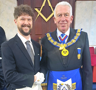 Carl Rothwell being congratulated by Mark Matthews. Carl Rothwell being congratulated by Mark Matthews.