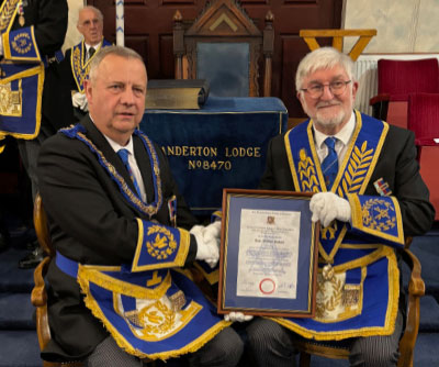 Peter Lockett (left) presenting the 50th certificate to John Robson. Peter Lockett (left) presenting the 50th certificate to John Robson.