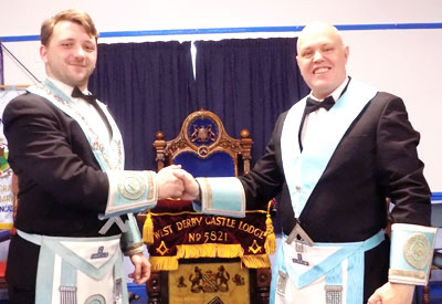 Michael (left) thanks David as installing master. Michael (left) thanks David as installing master.