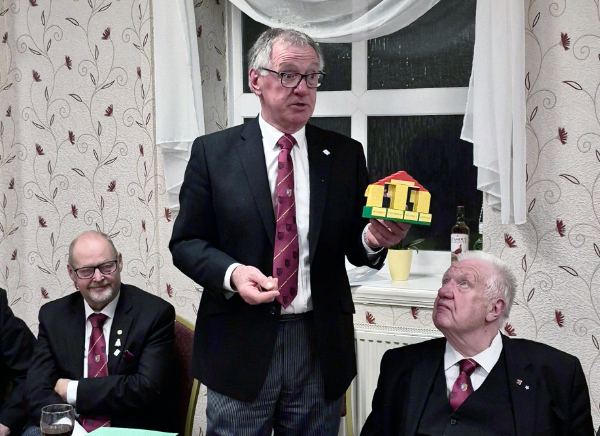John Robbie Porter, proudly displaying his Lego model of the principles of Freemasonry. John Robbie Porter, proudly displaying his Lego model of the principles of Freemasonry.