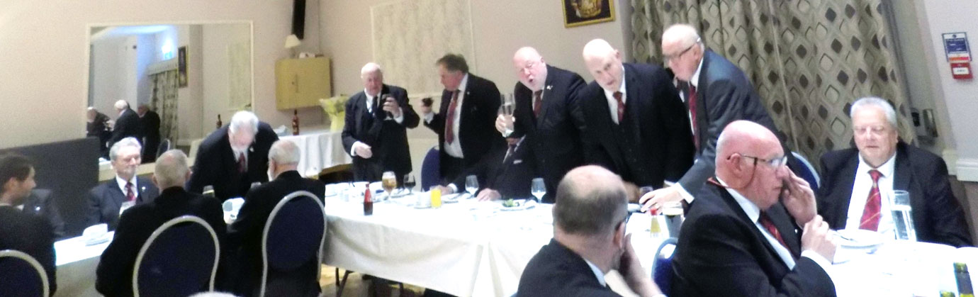 Wine taking at festive board Wine taking at festive board