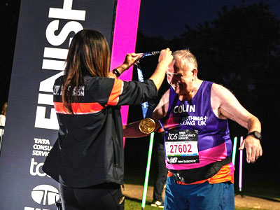 Colin receiving his medal. Colin receiving his medal.