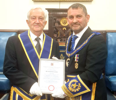 Bill Fawley (left) proudly holding his Jubilee certificate with David Thomas. Bill Fawley (left) proudly holding his Jubilee certificate with David Thomas.