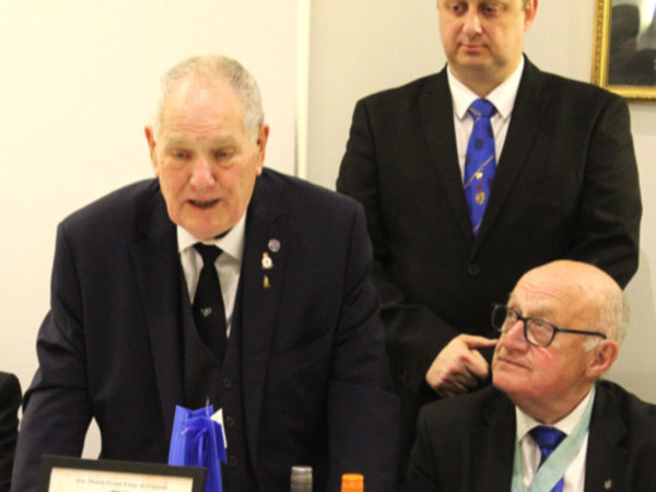 John Youldon (left) responds to his toast under the watchful eye of WM Ken Harding (seated) and Phil Renney (standing). John Youldon (left) responds to his toast under the watchful eye of WM Ken Harding (seated) and Phil Renney (standing).