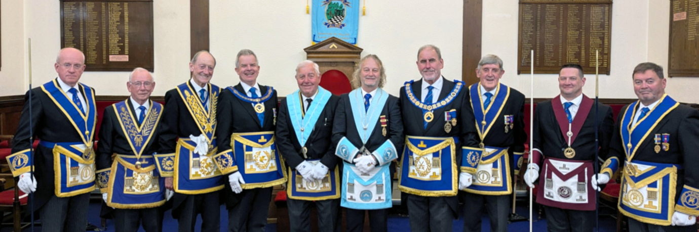 Bob Williams (centre) with his principal guests. Bob Williams (centre) with his principal guests.