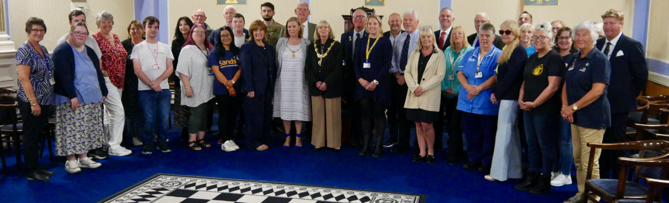 Invited dignitaries and charity representatives. Invited dignitaries and charity representatives.