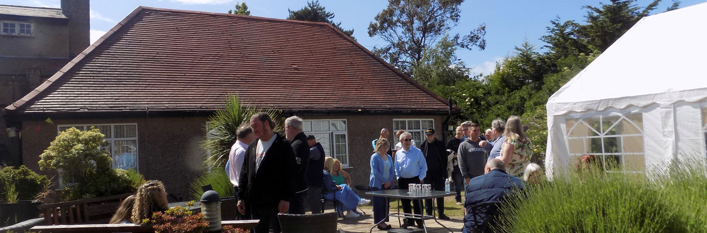 Visitors enjoy the sunshine at The Tithebarn. Visitors enjoy the sunshine at The Tithebarn.