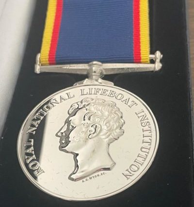 Malcolm’s medal. Malcolm’s medal.